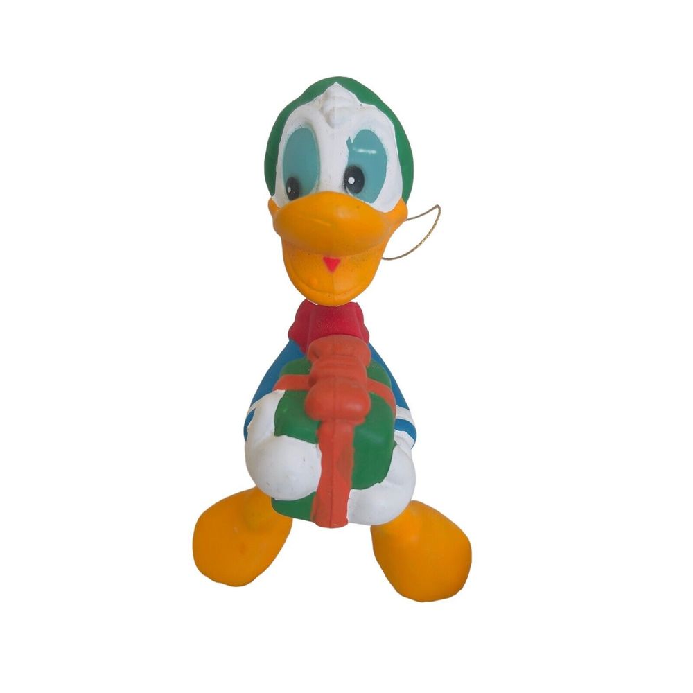 VTG Disney Plastic Donald Duck Present Giving Christmas Ornament 4.5”x2.5”‎